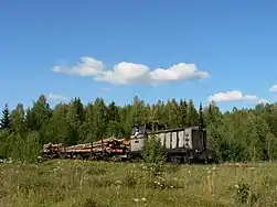Locomotive TU7-2039 with freight train