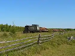 Locomotive TU7-2072 with freight train