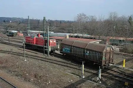 A switch engine pushes a car over the hump at Kornwestheim yard