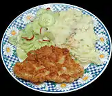 Kotlet z indyka turkey cutlet with spring onion mash potato, cucumber and radish salad.
