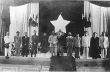 The National assembly of the Democratic Republic of Vietnam on 2 March 1946, supreme advisor Vĩnh Thụy (Bảo Đại), sixth from right to left, next to President Hồ Chí Minh (middle).