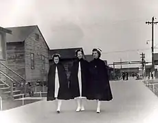 Laura Cobb, walking, center.