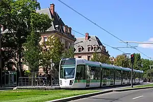 Tram on Line T3a on grassed track in front of the Cité Internationale Universitaire de Paris