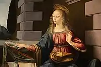 Detail of Leonardo da Vinci's Annunciation (c. 1472–1475) shows the Virgin Mary reading the Bible.