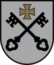 Argent two keys sable saltirewise under a cross pattée or (Lesser coat of arms of Riga, Latvia)