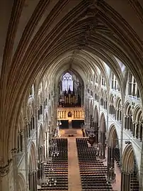 Nave of Lincoln Cathedral (begun 1185) showing three levels; arcade (bottom); tribune (middle) and clerestory (top).