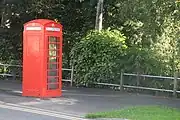 Listed telephone box at the garden entrance