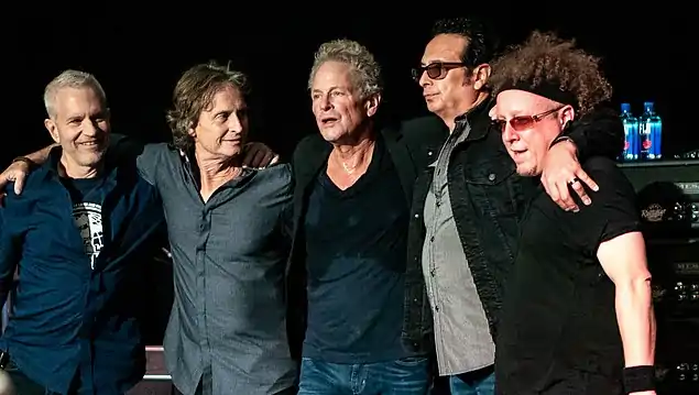 Brett Tuggle (second from left) in 2018