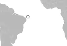 Map of the southern Atlantic Ocean with southwestern Africa and northeastern South America, with an island off northeastern Brazil highlighted.