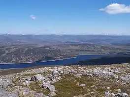 A long lake surrounded by hills
