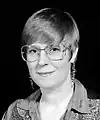 Image 60Lois McMaster Bujold with pixie cut and denim western shirt, 1996 (from 1990s in fashion)