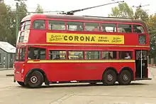 Red double-deck trolleybus.