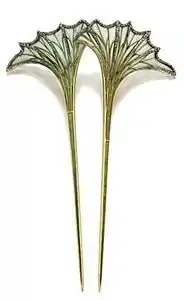 Translucent enamel flowers with small diamonds in the veins, by Louis Aucoc (c. 1900)