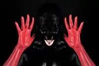 Low-key photograph combined mixed with red; two light sources