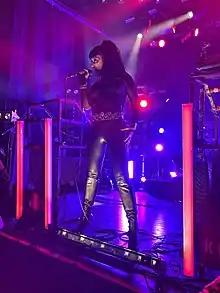 Lucia Cifarelli in concert performing with KMFDM in October 2022.