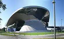 BMW Welt, (BMW World), is a museum and event venue at the Olympic Park, Milbertshofen-Am Hart, Munich, Germany, designed by Viennese professor Wolf D. Prix and architect firm Coop Himmelb (l) au, 2007.