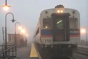 MARC conductors catching up with local news on a foggy morning