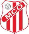 MC Oran's crest, 1975