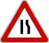 Road narrows on left