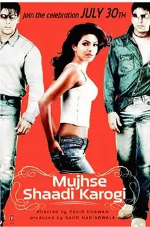 The poster features two young men pursuing a woman with sand and black themed colour in the background. Text at the bottom of the poster reveals the tagline of the film while the text at the bottom of the poster reveals the title, name of the director, name of the producer, name of the distributor, the release date and the rest of the credits.