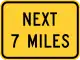 Next (distance) miles ahead