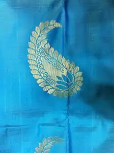 Modern silk sari with mankolam design, made in Kanchipuram