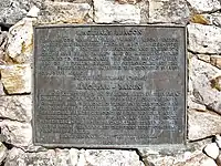 The plaque at Maclear's beacon at the highest point on Table Mountain (and the Cape Peninsula) at 1084&nbsp;m. It commemorates Maclear's recalculation of the curvature of the Earth in the Southern Hemisphere. In 1750, Abbé Nicolas Louis de Lacaille had measured the curvature of a meridian arc northwards from Cape Town, to determine the figure of the Earth, and found that the curvature of the Earth was less in southern latitudes than at corresponding northern ones (i.e. that the Earth was slightly pear-shaped, with the wider bulge south of the equator). However, when Sir George Everest visited the Cape in 1820 and inspected the site of La Caille's measurements in Cape Town, he suggested to Maclear that the gravitational effect of Table Mountain could have caused a miscalculation of the curvature of the meridian. This was based on Everest's experience in the Himalayas. Taking this factor into account Maclear established the curvature of the Southern Hemisphere was in fact the same as that of the Northern Hemisphere.