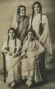 Devi with her three daughters