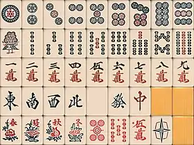 Another Japan style, no different when we turn the bamboos upside down. There is a blind spot on the red five tiles. The dora white dragon is designed as Kyūshū style.  8 flower tiles version is present.