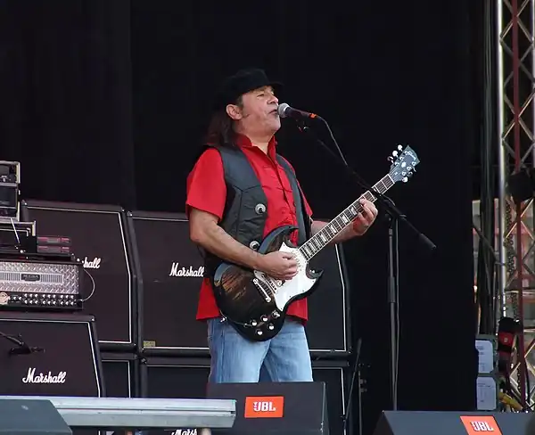 McNulty performing with Slade in 2011.