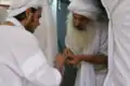 An initiate receiving a sacred gold ring called Shom Yawar Ziwa