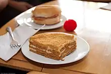 Mango float, an icebox cake dessert from the Philippines using graham crackers, cream, and ripe Philippine mango