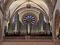 Pipe organ and rose window.