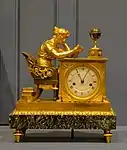 Mantel clock called The Reader; by Jean-Andre Reiche; circa 1810; matte and polished gilt bronze and "Vert de Mer" marble; 31 x 15 x 26&nbsp;cm; Montreal Museum of Fine Arts (Montreal, Canada)