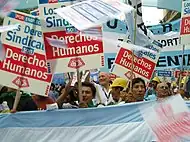 Image 40Union members march in Argentina on Human Rights Day in December 2005. The signs read "Worker rights are human rights..