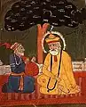 Mardana seated to the left of Nanak with his characteristic rabab