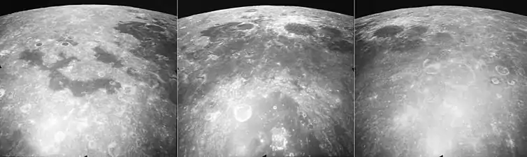 These are three views of Mare Marginis, taken by the mapping camera of the Apollo 17 mission in 1972, facing north-northeast from an average altitude of 124&nbsp;km.  At the right is the east side of Mare Marginis, with the craters Jansky, Jansky F, and the elongated Jansky D in the foreground, and the eastern mare is in the upper left.  The center photo shows the central mare with the prominent crater Goddard surrounded by light materials, the crater Ibn Yunus immediately to its east, Goddard C to the west, half of the large crater Neper in the foreground, and the crater  Hubble far to the north near the horizon.  The swirls of light material in the mare, thought to be caused by magnetic fields, are visible in this photo.  The left photo shows the western mare (more easily visible from Earth), with disconnected "lakes" of basalt, and the crater Cannon.  These photos were taken within minutes of each other as the Command Module America orbited the moon.