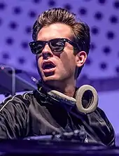 A head shot of Mark Ronson looking to his right.