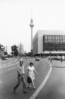 Marx-Engels-Platz and the Palace of the Republic in East Berlin in the summer of 1989. The Fernsehturmcode: deu promoted to code: de  (TV Tower) is visible in the background.