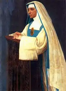 The religious habit of the Sisters of Mary Reparatrix is white, with a blue scapular, a white and blue veil and a large golden heart on the breast.