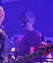 Refosco performing with Atoms for Peace in 2013