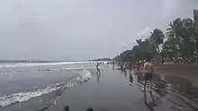 Image 10Limbe Beach with people engaging in various activities (from Tourism in Cameroon)