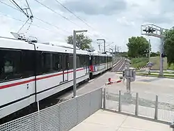 MetroLink train departing from the Sunnen station.