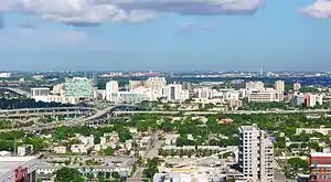 Miami's Health District with the Midtown Interchange in the foreground and Miami International Airport in the background, June 2010