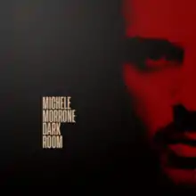 Black square with Michele Morrone face and the words "MICHELE MORRONE DARK ROOM".