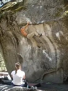 Bouldering on Midnight Lightning, in Yosemite