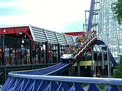 Roller coaster train on a small hill