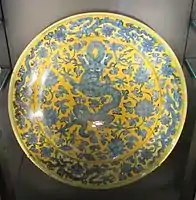 Dish with underglaze blue dragon and yellow enamel, Ming