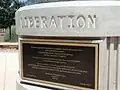 Liberation plaque – base of memorial