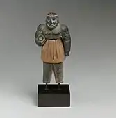 Monstrous male figure; late 3rd–early 2nd millennium BC; chlorite, calcite, gold and iron; height: 10.1&nbsp;cm; Metropolitan Museum of Art